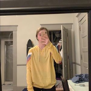 yellow long sleeve shirt